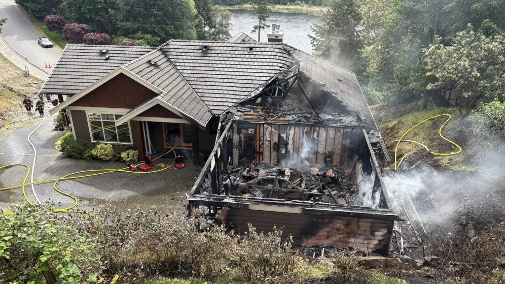 Garage heavily damaged as two people escape Nanoose Bay house fire
