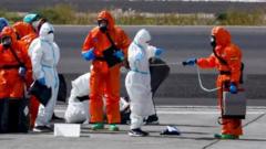 Countries airlift nationals evacuated from from virus-hit cruise ship